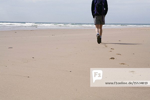 Man walking on a beach