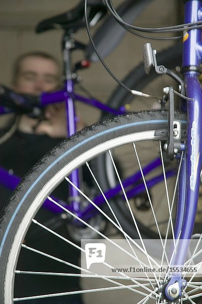 Man servicing a bike