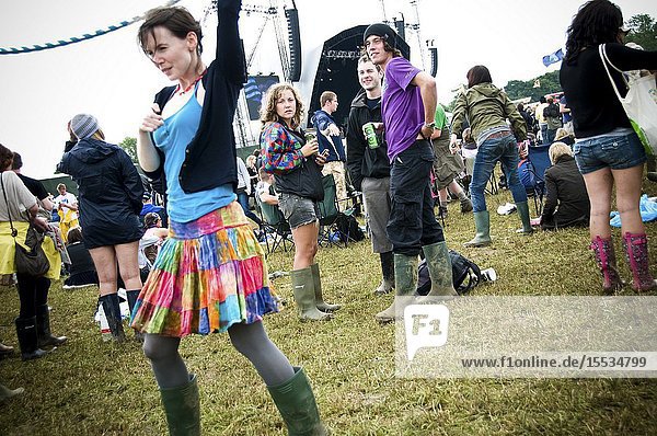 Glastonbury 2008 young woman dancing with onlookers