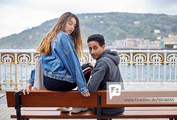 Couple of tourists visiting the city, Multiracial young couple, Donostia, San Sebastian, Gipuzkoa, Basque Country, Spain