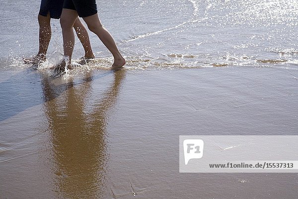 People walking in the sea