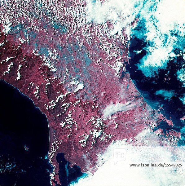 A vertical view of the western portion of the Republic of Panama on the Isthmus of Panama as photographed from Earth orbit by one of the six lenses of the Itek-furnished S190-A Multispectral Photographic Facility Experiment aboard the Skylab space station. This picture was taken with 2443 infrared color film. The large clear body of water on the north side of the isthmus is Golfo de los Mosquitos an extension of the Caribbean Sea. The large partly cloud-covered body of water on the south side of the isthmus is Golfo de Chiriqui an extension of the Pacific Ocean. Federal agencies participating with NASA on the EREP project are the Department of Agriculture Commerce Interior the Environmental Protection Agency and the Corps of Engineers. All EREP photography is available to the public through the Department of Interior's Earth Resources Observation Systems Data Center Sioux Falls South Dakota 57198.