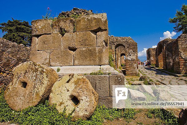 Millstones Excavations of Pompeii was an ancient Roman town destroyed by volcan Mount Vesuvius Pompei comune of Pompei Campania Italy Europe.