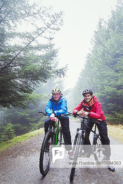 Father and son mountain biking