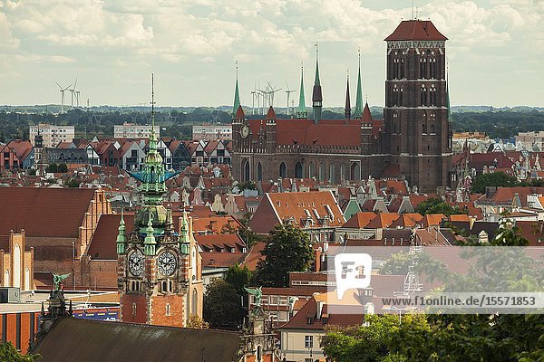 Summer afternoon in Gdansk old town Poland. St Mary's church dominates the skyline.