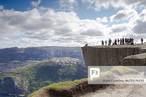 Preikestolen or Prekestolen. Pulpit Rock famous attraction near Stavanger. View on Lysefjord Norway traveling and hiking.
