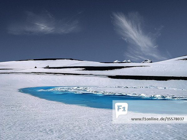 Blue pools of melting water Kisubotnar near Hofsjokull Ice Cap Iceland.