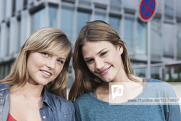 Germany  Cologne  Young woman smiling  portrait