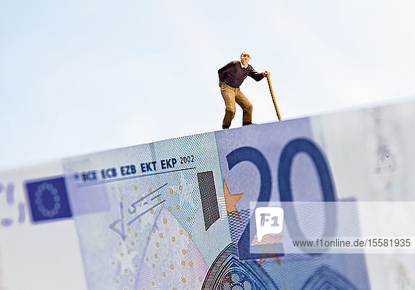 Figur mit Spazierstock auf 20-Euro-Schein