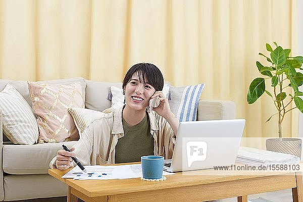 Young Japanese woman working at home