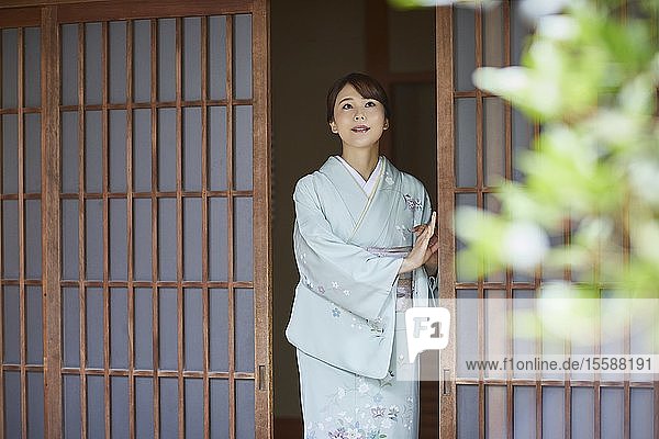 Young Japanese woman wearing traditional kimono