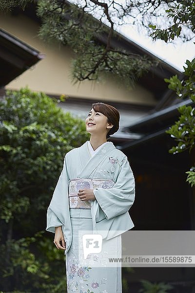 Young Japanese woman wearing traditional kimono
