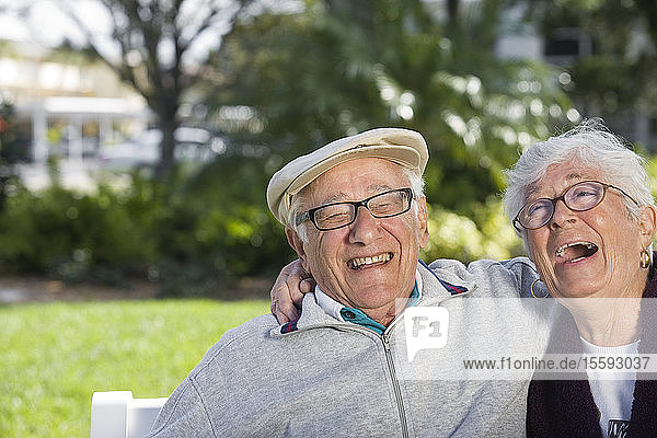 A senior couple in a park.