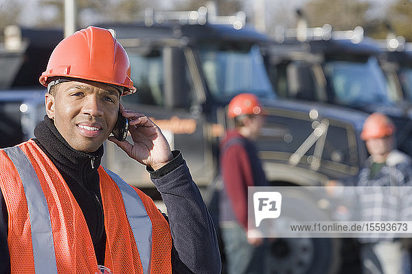 Engineer talking on a mobile phone