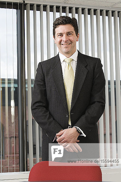 Portrait of a business man smiling.