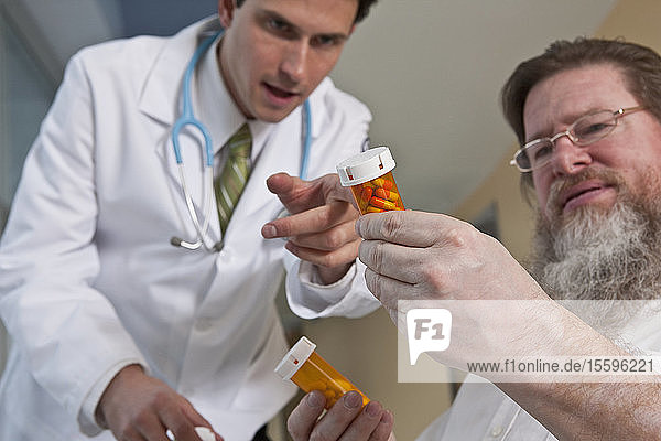 Doctor explaining a patient about medicine  man is bipolar