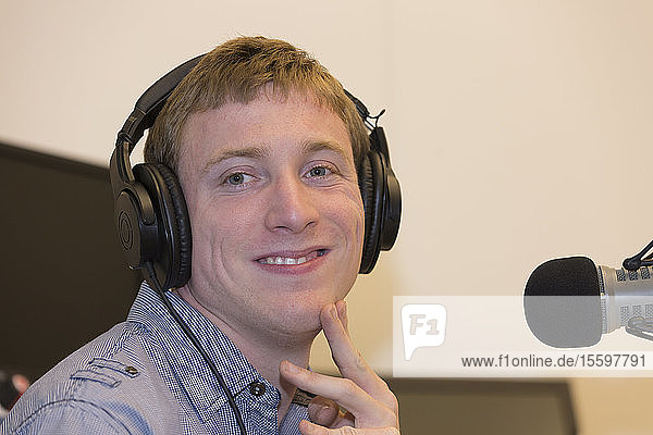 Young man with Cerebral Palsy hosting his radio show