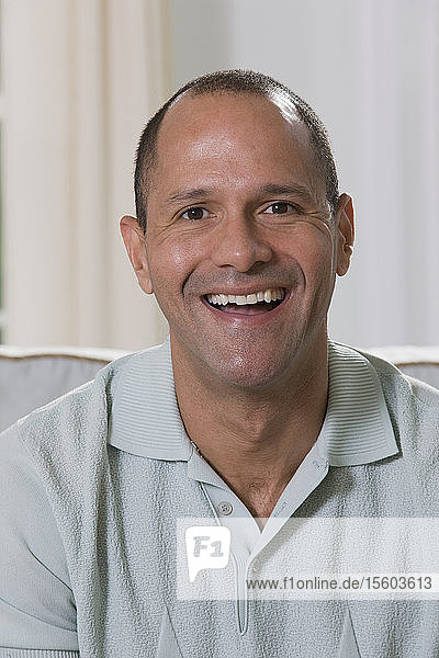 Portrait of a Hispanic man smiling