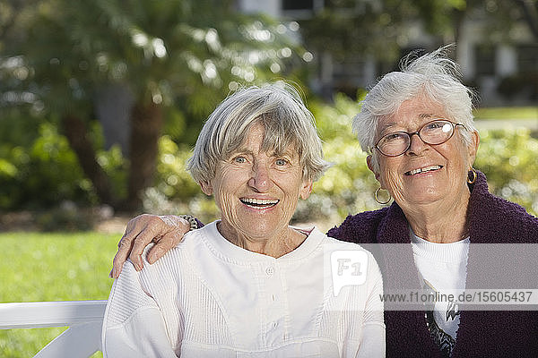 Portrait of two senior women smiling.
