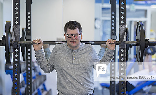 Man with Visual Impairment working out in gym