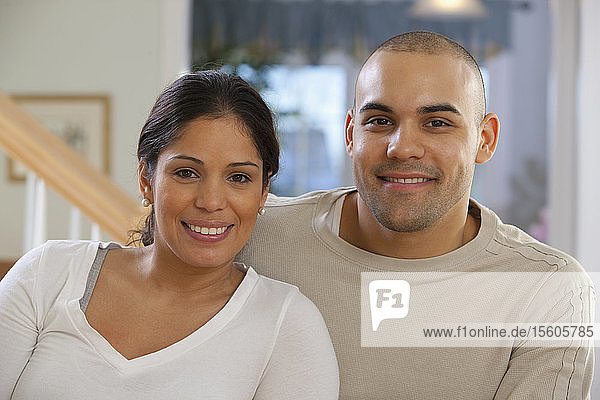 Portrait of a Hispanic couple smiling
