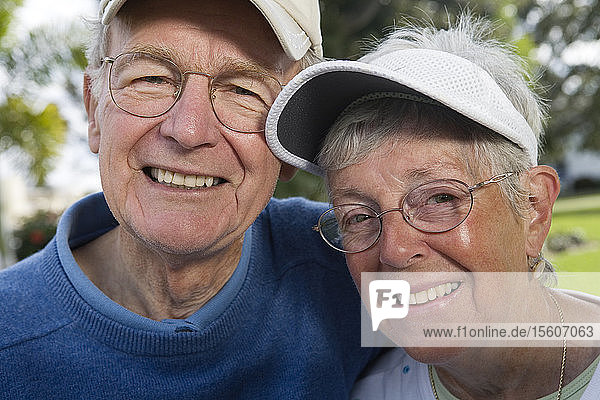 Portrait of a senior couple in a park.