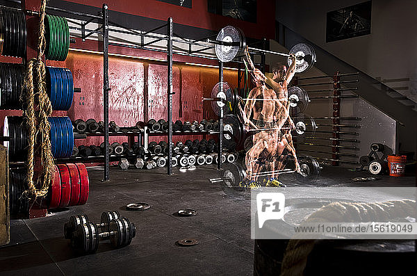 Multiple exposure of a crossfit athlete performing a barbell exercise at a gym in San Diego  California.