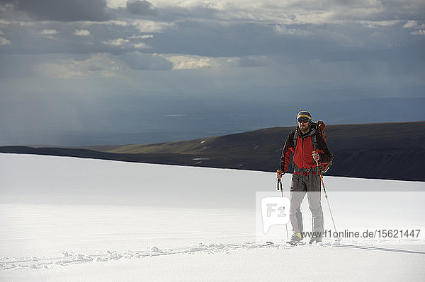 Team ascends to 11 000-feet on the Sheep Glacier during ski ascent of Mount Sanford in the Wrangell-St. Elias National Park outside of Glennallen  Alaska June 2011. Mount Sanford at 16 237 feet is the sixth tallest mountain in the United States. (Model Release: Patrick Gilroy)