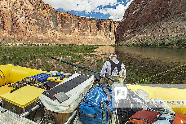 Man Getting Ready To Fly Fish Near Horseshoe Bend In The Grand Canyon