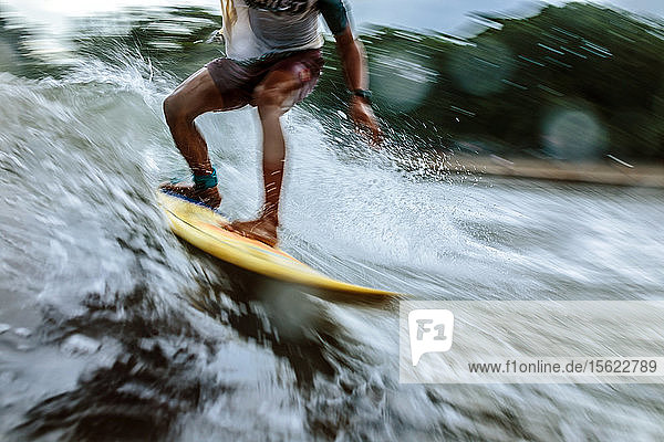Male surfer on wave