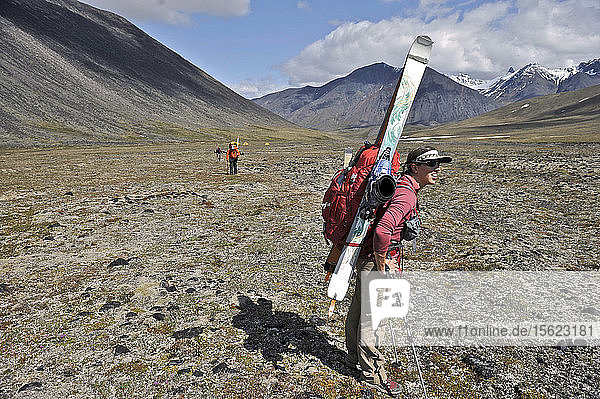Skiers haul a cache to Camp One on the Sheep Glacier in preparation for a ski ascents of Mount Sanford in the Wrangell-St. Elias National Park outside of Glennallen  Alaska June 2011. Mount Sanford at 16 237 feet is the sixth tallest mountain in the United States. (Model Release: Patrick Gilroy  Adam Howard and Agnes Hage)