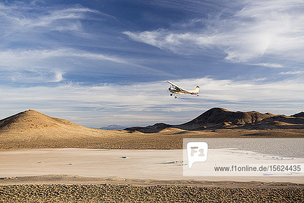 Plane coming in for a landing over the rural Nevada Desert at the High Sierra Fly In