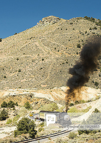 Steam trail driving though Nevada desert on its way between Carson City and Virgina City. Virgina & Truckee Railroad