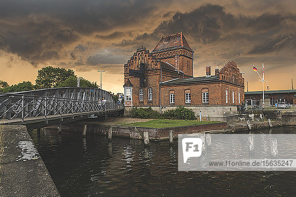 Swing bridge over river by Peter Rehder House at LÃ¼beck  Germany