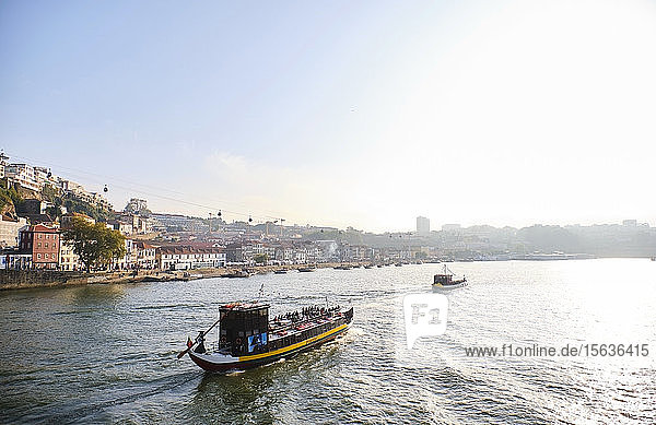 Portugal  Porto  Vila Nova de Gaia  Rabelo boats transporting wine along Douro riverÂ 