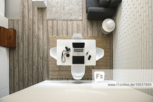 Modern loft with workingspace seen from above