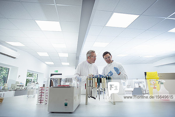 Scientists in discussion in laboratory