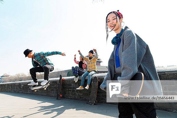 Young people skateboarding