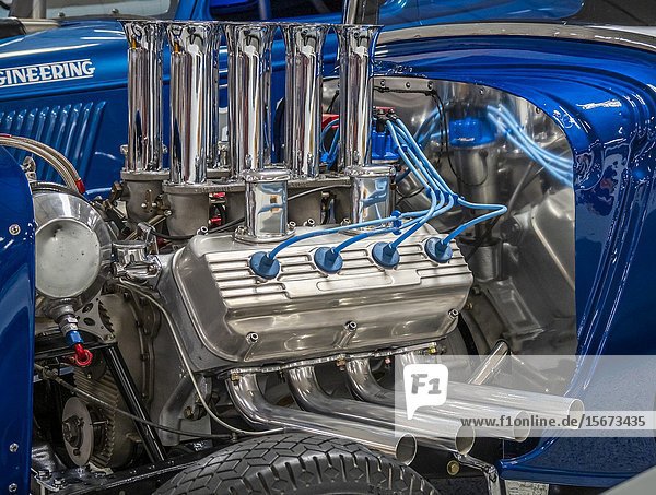 Chrome covered powerful hot rod car engines.