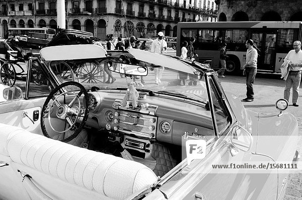 Cuba: Orange Buick Oldtimer in front of the capitolio in the capital city Havanna.