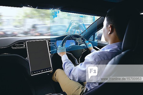 Japanese man in self driving car