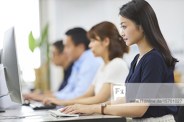 Japanese woman working in the office