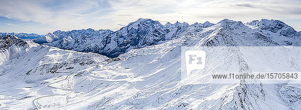 Aerial view by drone of Stelvio Pass road and snowy Ortles mountain, Sondrio province, Valtellina, Lombardy, Italy, Europe