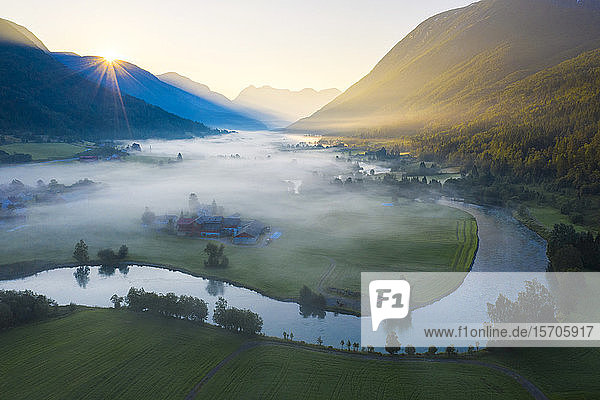 Mist over the cultivated fields along Stryneelva river aerial view Stryn Nordfjorden Sogn og Fjordane county Norway Scandinavia Europe