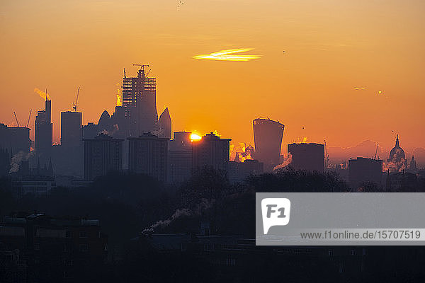 UK  England  London  City skyline at moody sunrise