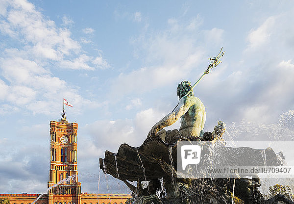 Germany Berlin Neptune Fountain against Rotes Rathaus building