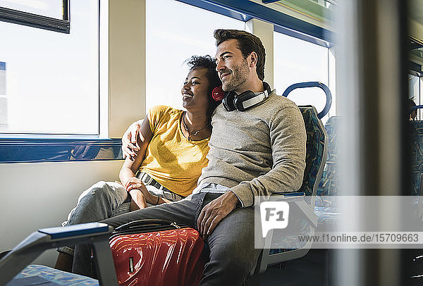 Young couple relaxing in a train