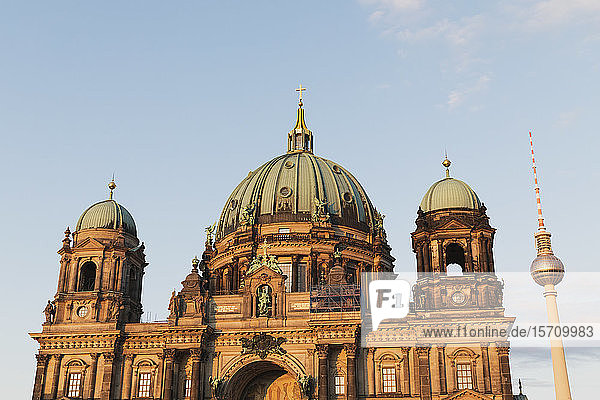 Germany Berlin Facade of Berlin Cathedral with Berlin TV Tower in background
