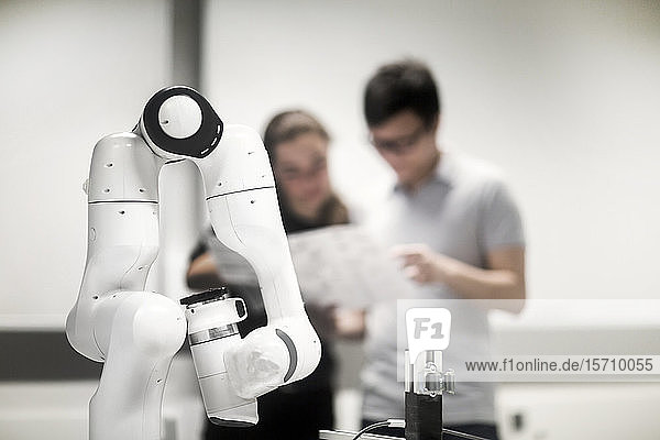 Sudents studying robotic at an university institute