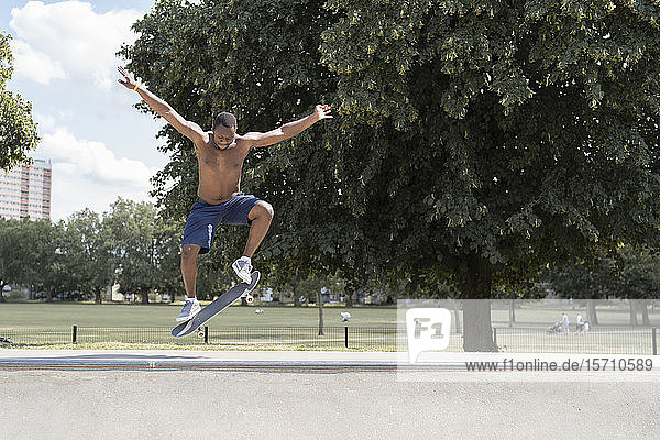 Man skating in skate park